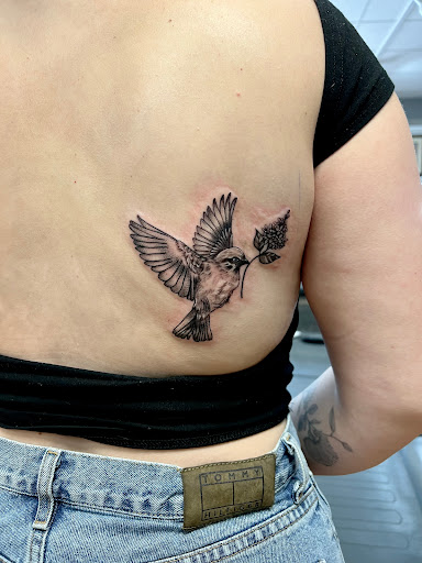 Explore white ink tattoo ideas, creative tattoo ideas in Menomonie, available at Blue Dragon Tattoo