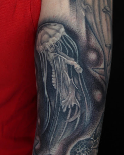 Explore tattoo ideas arm shoulder, creative tattoo ideas in Matthews, available at Divine Arts Tattoo Company