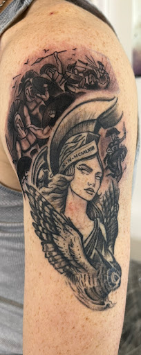 Explore marathon tattoo ideas for guys, creative tattoo ideas in Rogers, available at Ink Solutions Tattoo