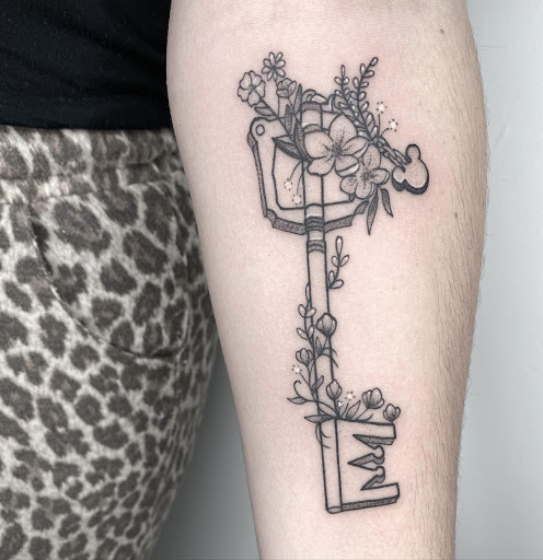 Explore cherry blossom tattoo ideas, creative tattoo ideas in Lancaster, available at MermGoddess Tattoo Studio & Gallery