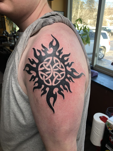 Find tattoo ideas for the back for your next unique tattoo in Duluth at Gitchee Gumee Tattoo