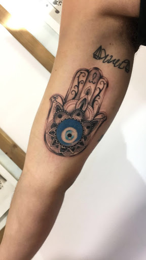 Explore anime neck tattoo ideas, creative tattoo ideas in Farmington, available at TATTOO 13 & Laser Tattoo Removal