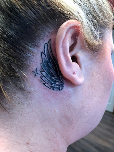 Explore cover up tattoo ideas female shoulder, creative tattoo ideas in Sanford, available at Hudson & Company Tattoo Studio