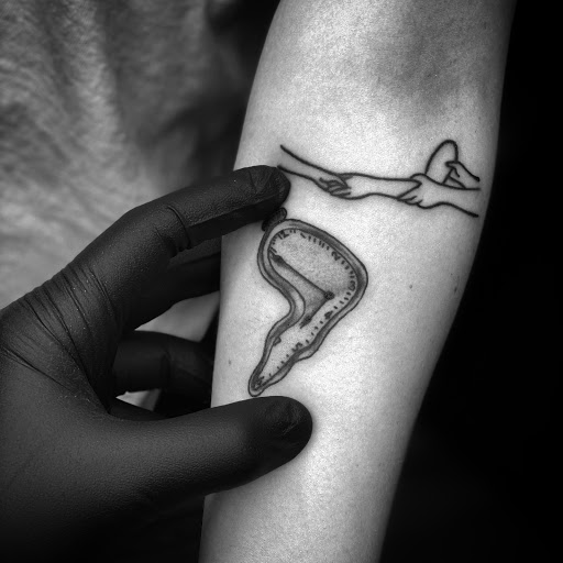 Explore small leg tattoo ideas, creative tattoo ideas in Elkview, available at Andy Electric Tattoos