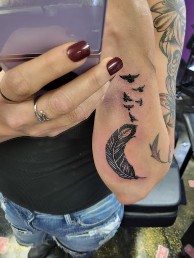 Explore tattoo ideas for words, creative tattoo ideas in Danville, available at The Pokers Club Tattoo Studio