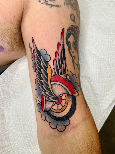 Explore women's forearm tattoo ideas, creative tattoo ideas in Elkin, available at Black Bear Tattoo