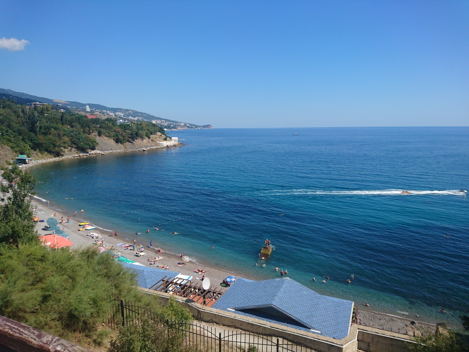 Photo of Alupka beach with turquoise pure water surface