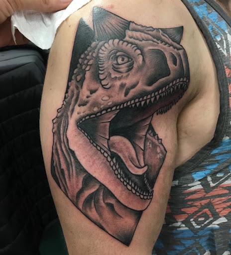 Explore coqui tattoo ideas, creative tattoo ideas in Spartanburg, available at The Gallery Tattoo Shop Spartanburg