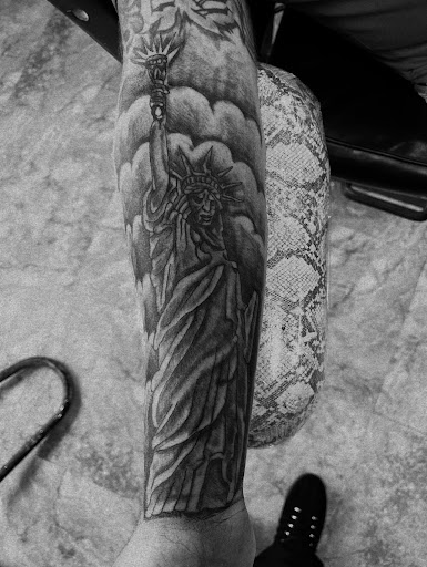 Explore brother bear tattoo ideas, creative tattoo ideas in Seymour, available at American Gypsy Tattoo Corp.