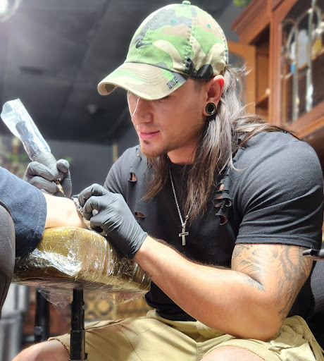 Explore tribal wrist tattoo ideas, creative tattoo ideas in Fort Worth, available at Darkside of Texas Tattoo & Piercing