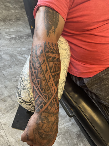 Find angel tattoo ideas for females for your next unique tattoo in Seymour at American Gypsy Tattoo Corp.