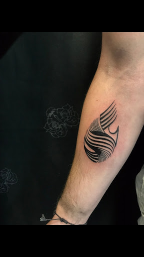 Explore first tattoo ideas for women, creative tattoo ideas in Logan, available at Surreal Ink Tattoo & Body Piercing