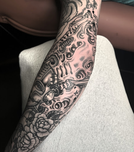 Explore flower and butterfly tattoo ideas, creative tattoo ideas in Edgewood, available at Wild Coyote Tattoo