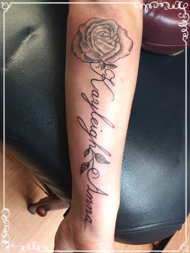 Explore dirt bike tattoo ideas, creative tattoo ideas in La Crosse, available at La Crosse Tattoo