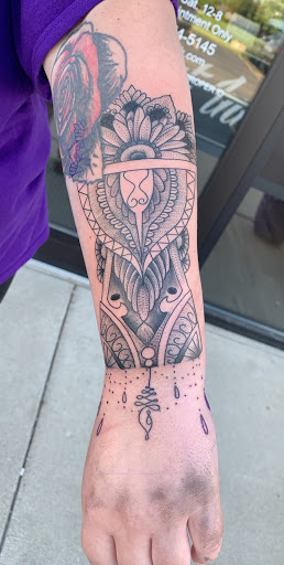 Explore color flower tattoo ideas, creative tattoo ideas in Kenosha, available at Dead Set Ink