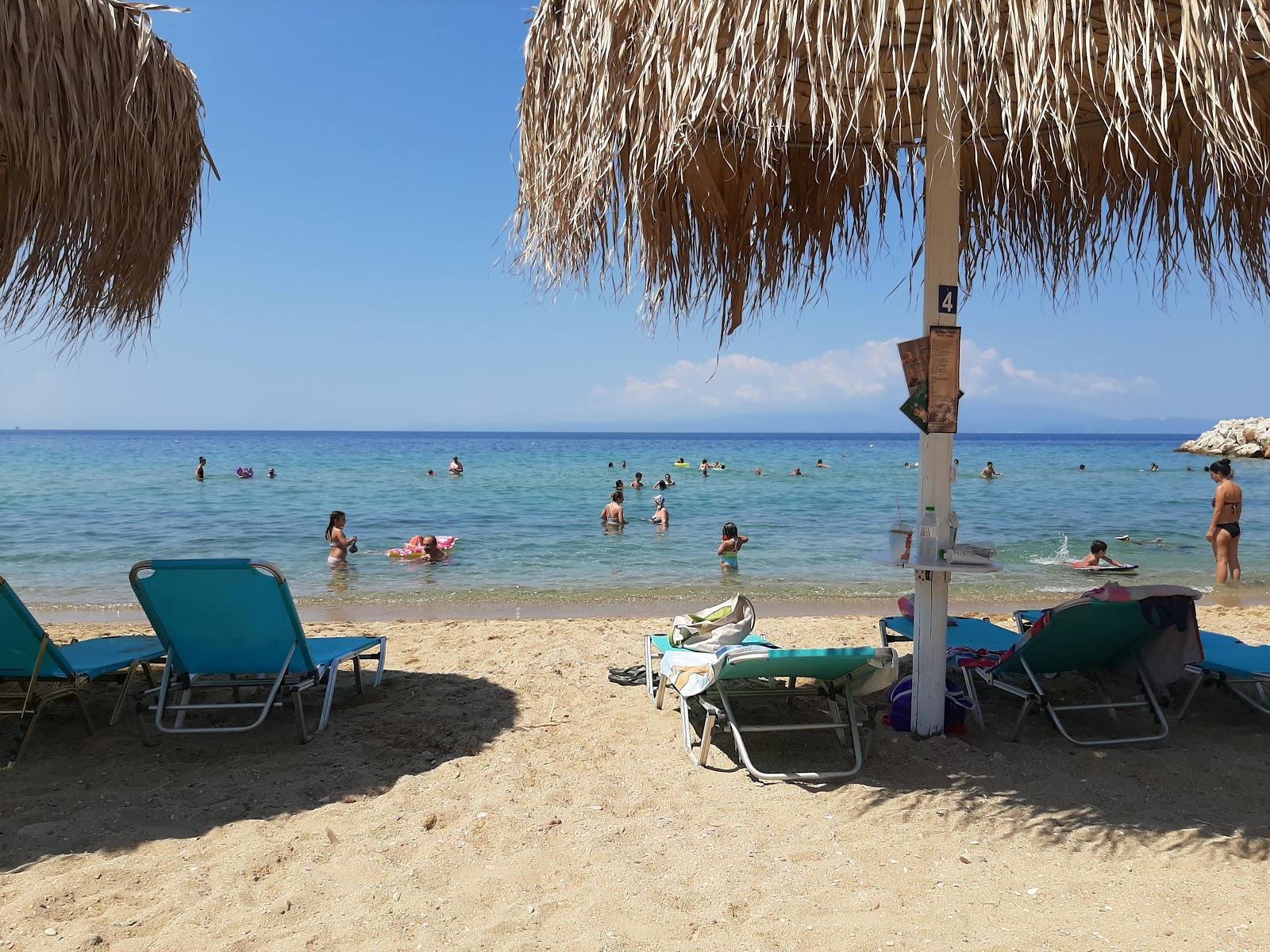 Foto di Napoleon beach con una superficie del sabbia luminosa