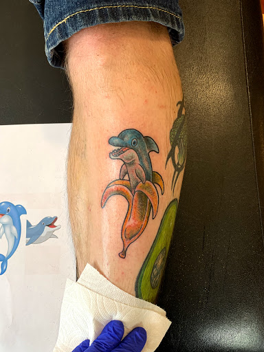 Explore fishing tattoo ideas for men, creative tattoo ideas in Minneapolis, available at Nokomis Tattoo