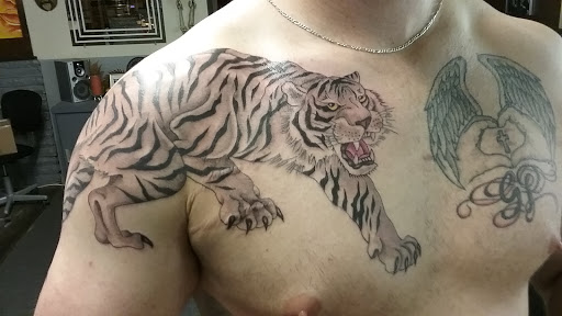 Explore flower tattoo cover up ideas, creative tattoo ideas in Philadelphia, available at Tattoo Odyssey Inc