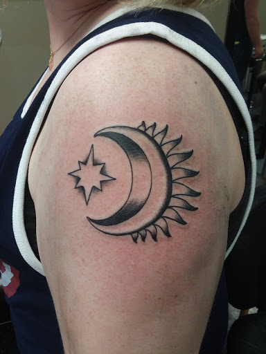 Find angel tattoo ideas for guys for your next unique tattoo in Lincoln at Iron Brush Tattoo