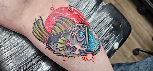 Explore dark romance book tattoo ideas, creative tattoo ideas in Cheyenne, available at The T.R.I.B.E. Zoo, LLC Tattoo