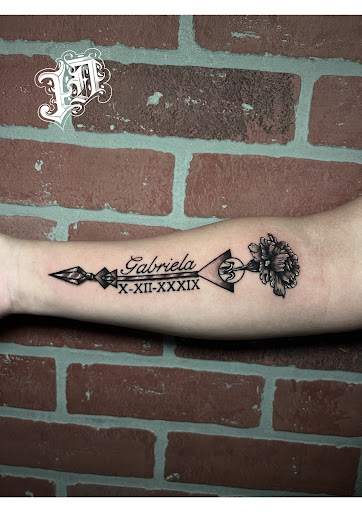 Explore roman numeral tattoo ideas, creative tattoo ideas in Kissimmee, available at Fallen Heroes Tattoo & Piercing (Florida)