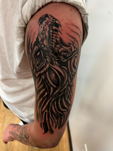 Explore pickle tattoo ideas, creative tattoo ideas in Seymour, available at American Gypsy Tattoo Corp.