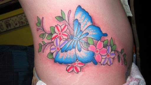 Explore surfboard tattoo ideas, creative tattoo ideas in Erie, available at Ink Assassins