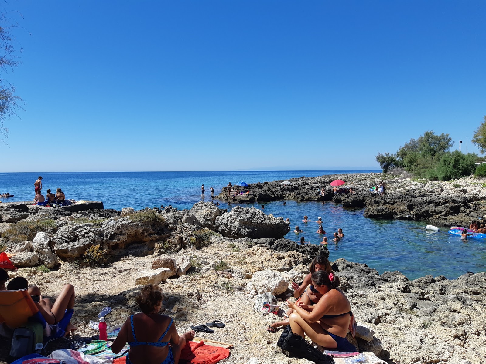 Foto von Spiaggia di Posto Vecchio mit winzige bucht