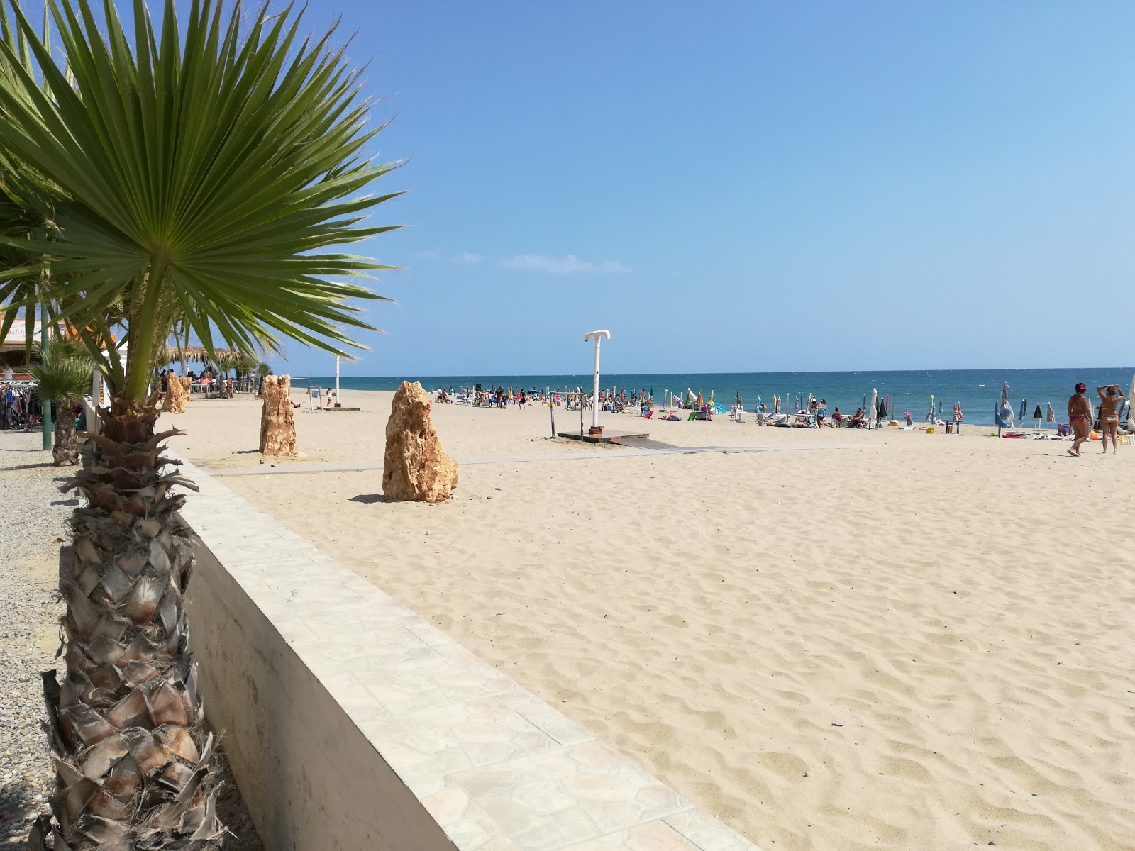Foto van Solito Posto beach met blauw water oppervlakte