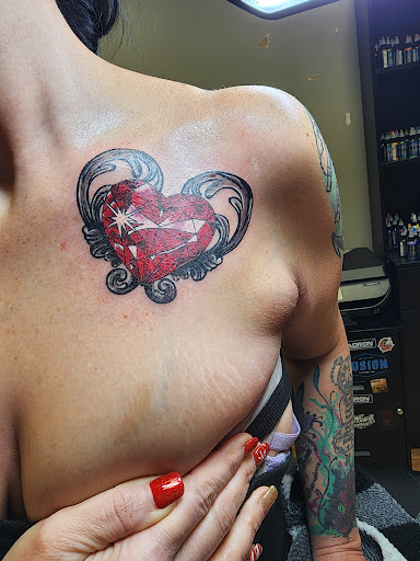 Explore small behind ear tattoo ideas, creative tattoo ideas in Dickinson, available at Creative InSight Tattoo