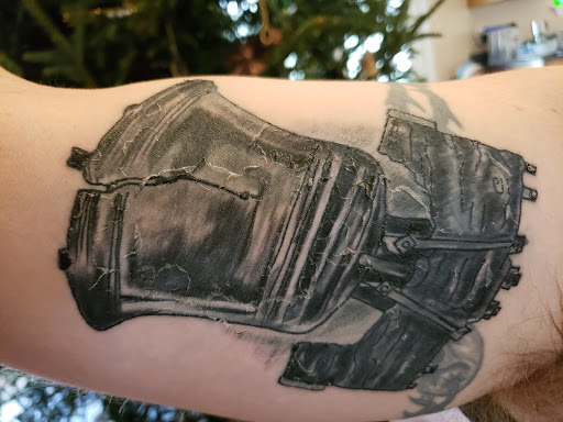Explore army sleeve tattoo ideas, creative tattoo ideas in Fayette, available at Everlasting Ink Tattoo & Social Club