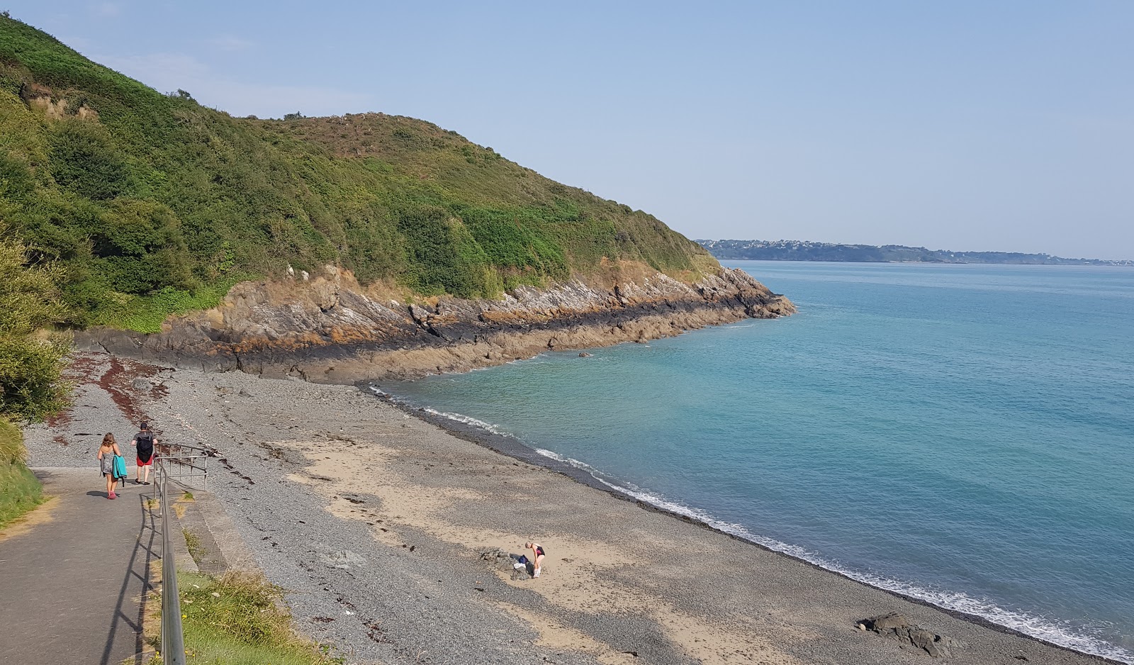 Plage du Petit Havre的照片 带有黑色沙和卵石表面
