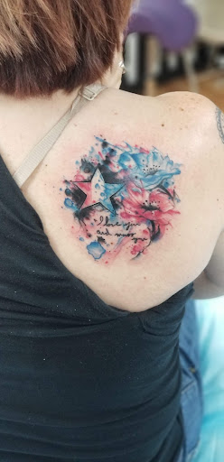 Explore tattoo ideas child's name, creative tattoo ideas in Benton, available at Spectrum Tattoo