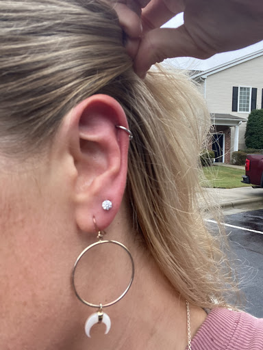 Find women's rib tattoo ideas for your next unique tattoo in Durham at Twisted Sixs