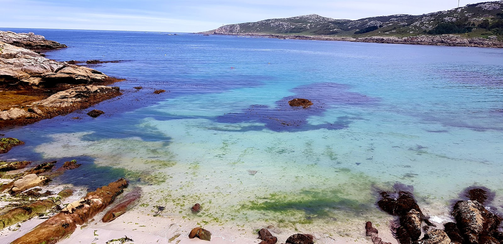 Fotografie cu Praia de Santamarina cu o suprafață de nisip alb