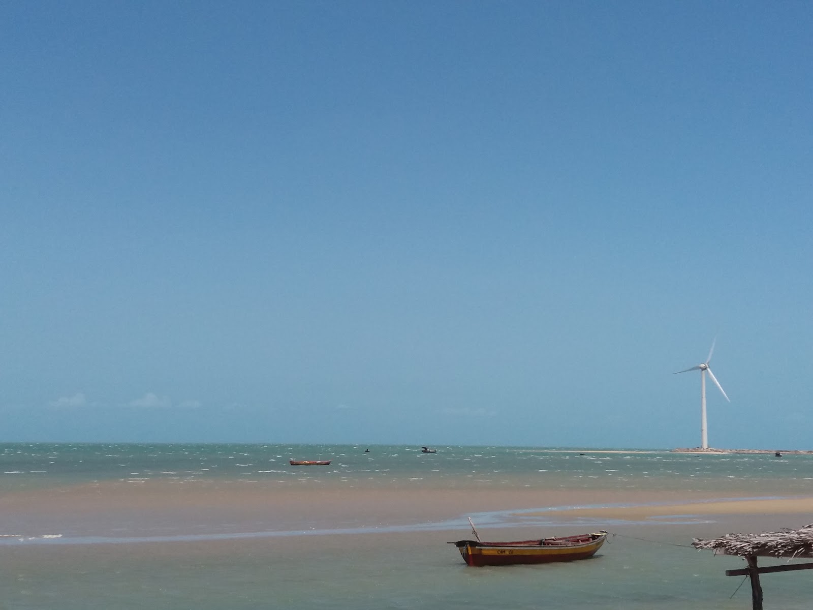 Foto di Praia das Dunas con costa lunga e dritta