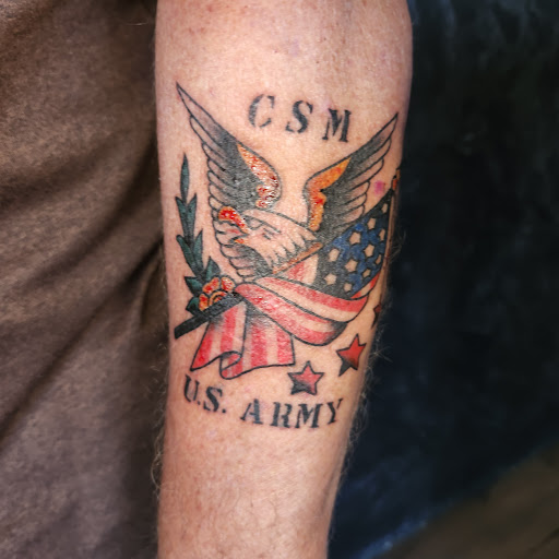 Explore cash tattoo ideas, creative tattoo ideas in Palm Coast, available at Devoted Tattoo Studio