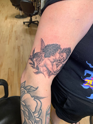 Explore back piece tattoo ideas, creative tattoo ideas in Duluth, available at Anchors End Tattoo