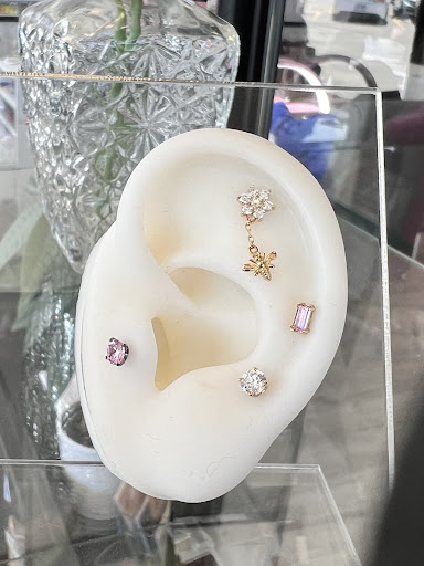 Explore matching mother daughter tattoos ideas, creative tattoo ideas in Milwaukee, available at Beauty is Pain Tattoo and Body Piercings