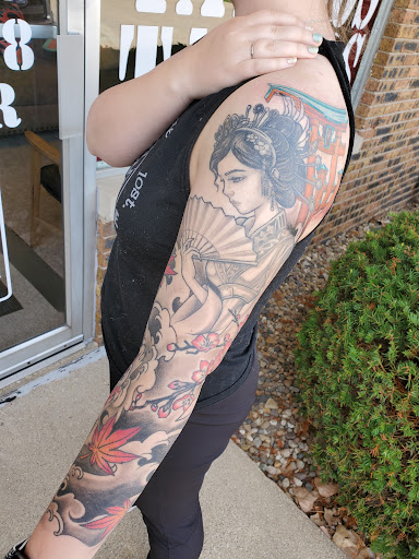 Explore american sleeve tattoo ideas, creative tattoo ideas in Peoria, available at Guerrilla Ink Tattoos