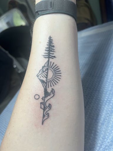 Explore thigh tattoo ideas for women, creative tattoo ideas in Nashville, available at Dead Ahead Tattoo Co.