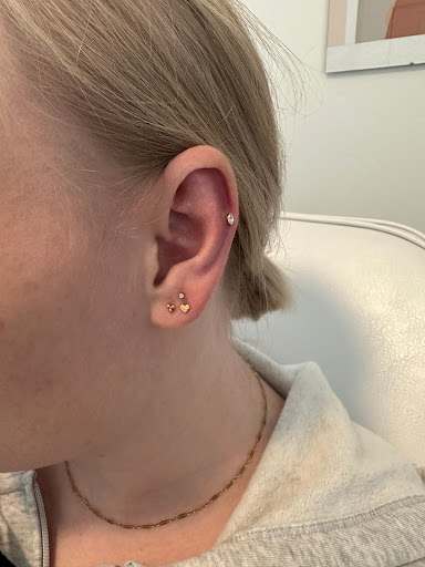 Explore august birth flower tattoo ideas, creative tattoo ideas in Orem, available at Pierced the Studio