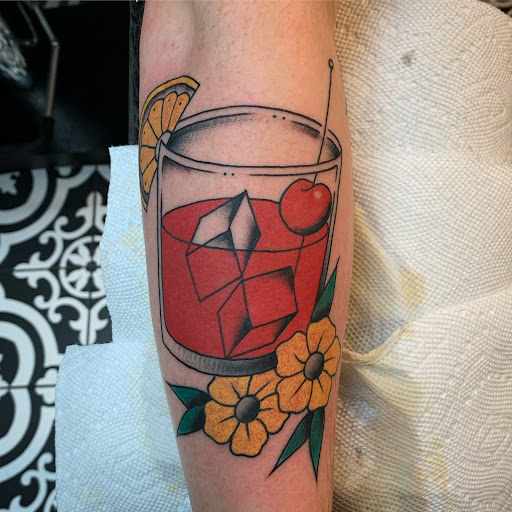 Explore biking tattoo ideas, creative tattoo ideas in Milwaukee, available at MANIA Tattoos Milwaukee