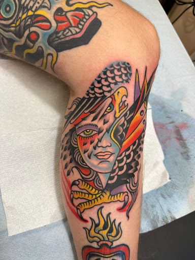 Explore hood neck tattoos ideas, creative tattoo ideas in Ann Arbor, available at Name Brand Tattoo