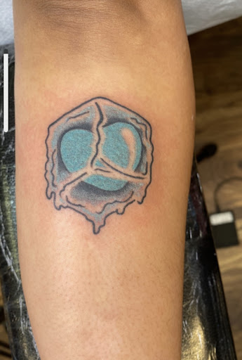 Explore felix the cat tattoo ideas, creative tattoo ideas in Baltimore, available at Rippd Canvas Tattoo Shop Artists Social Club