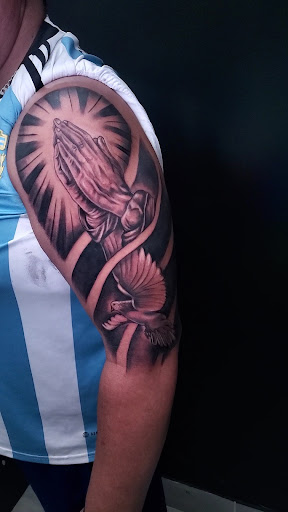 Explore chest piece tattoo ideas woman, creative tattoo ideas in Miami, available at Tatt Em Up Tattoos & Piercings