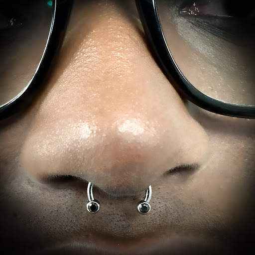 Find lipstick tattoo ideas for your next unique tattoo in Bay Shore at Piercings By Dean 95