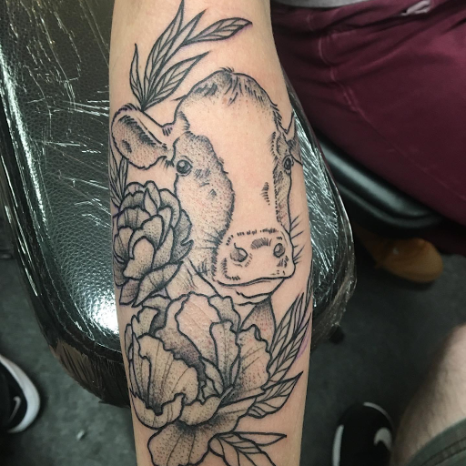 Explore cover up tattoo ideas back, creative tattoo ideas in Hazard, available at Lost Gypsy Tattoo