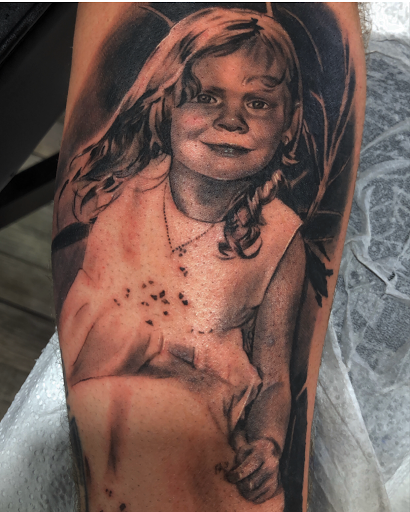 Explore black lab tattoo ideas, creative tattoo ideas in San Antonio, available at Firme Copias Tattoo Studio