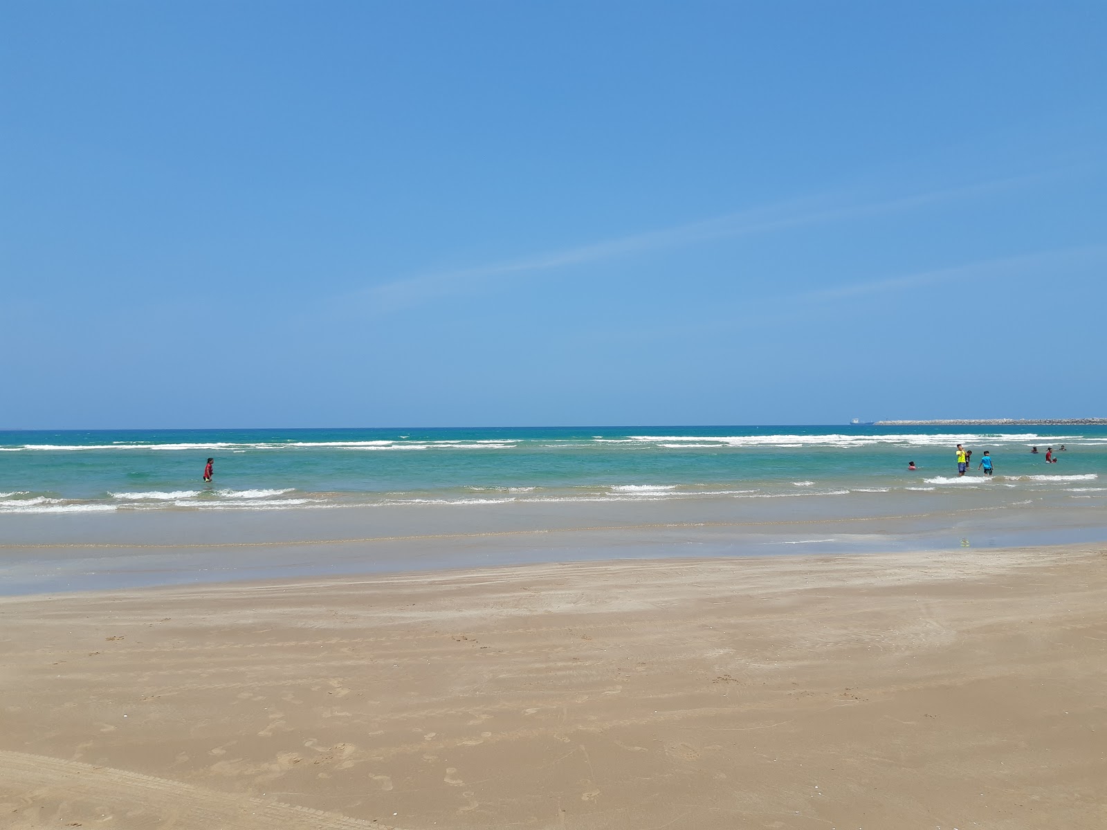 Foto de Playa Tesoro Altamira com areia fina e brilhante superfície